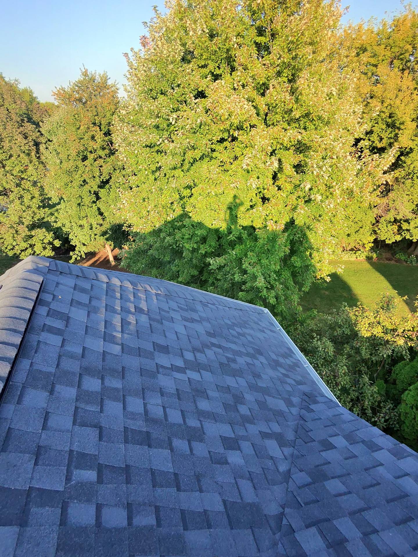 reroof_sun_vault_roofing_Madison_wi_east_side_moire_black_sunset_asphalt_shingle_20250922_close%285%29.jpg